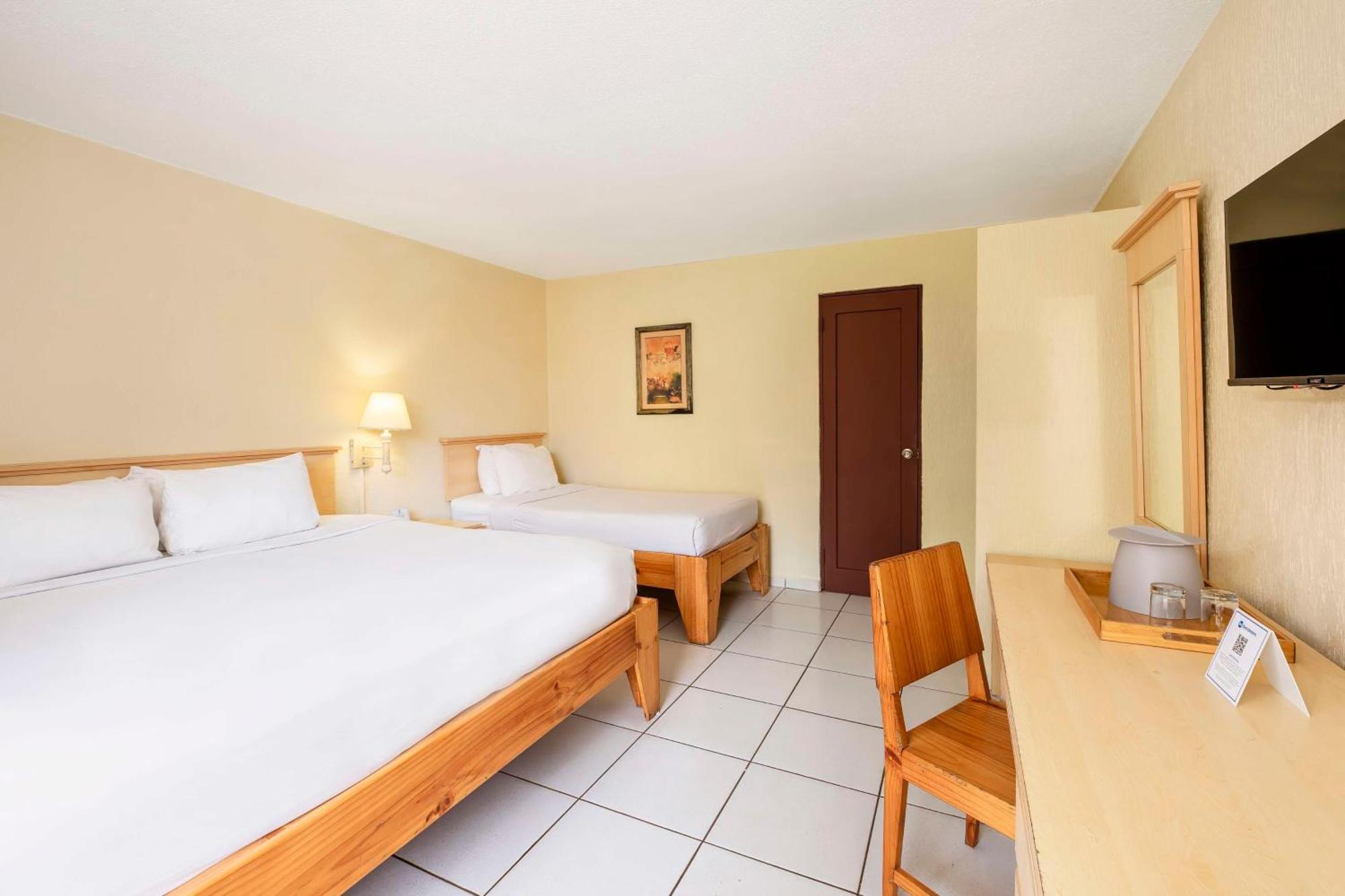 Room One Double One Single Bed Garden View Non-Smoking